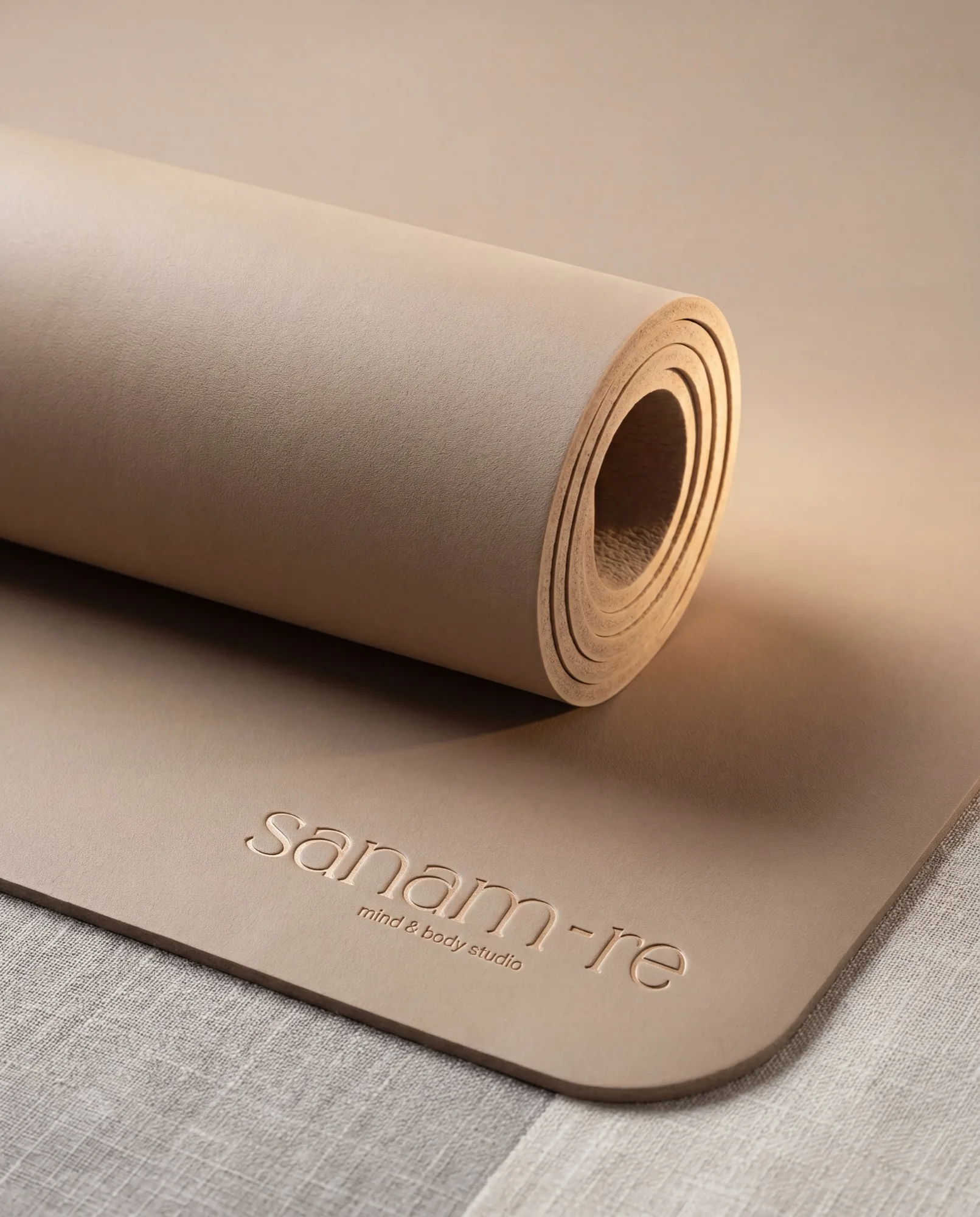 Sanam-Re Wellness Studio — branded yoga mat